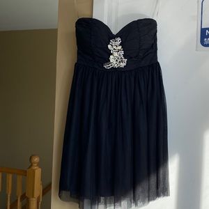 Strapless black mini dress with beaded front